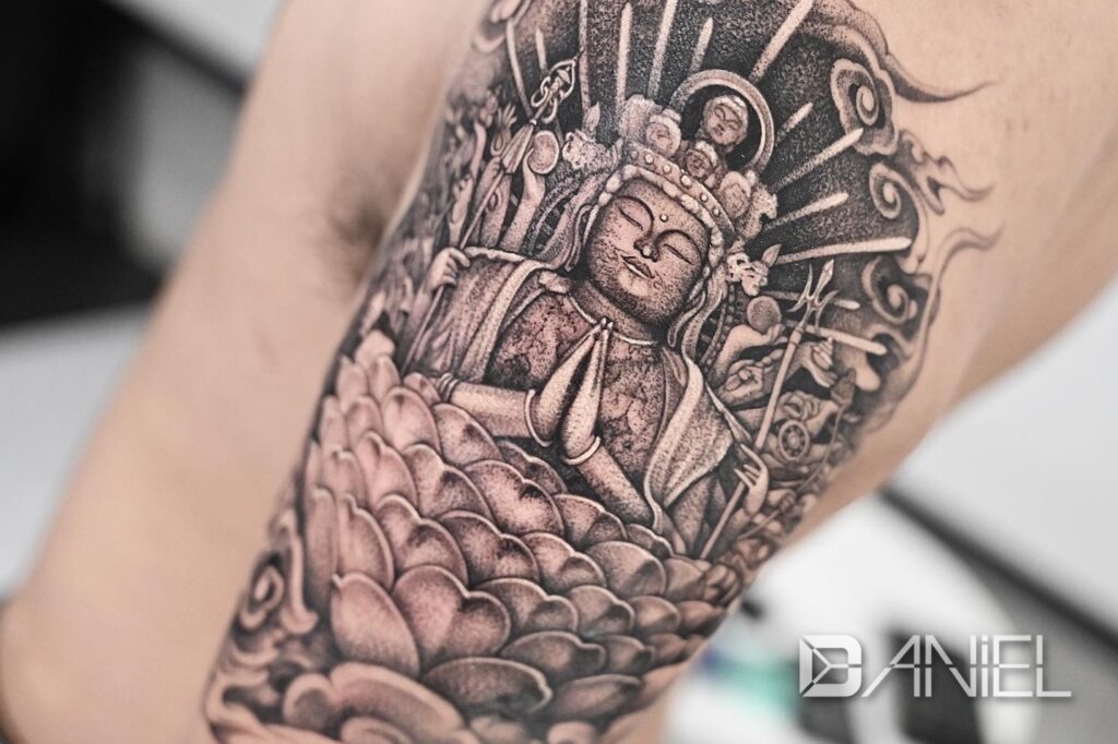 Buddhist statue tattoo Daniel02