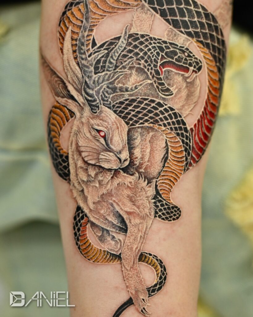 antima rabbit & snake tattoo daniel