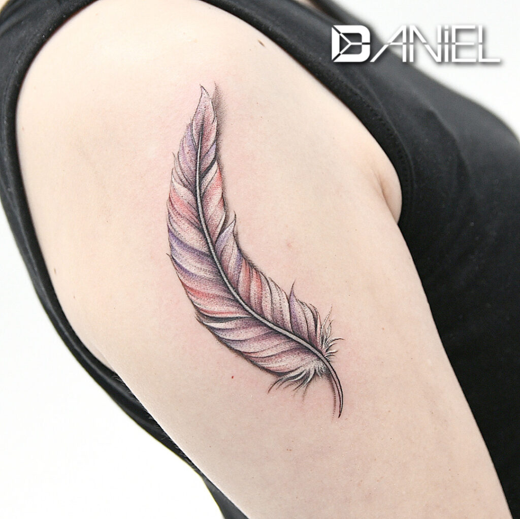 feather color tattoo Daniel