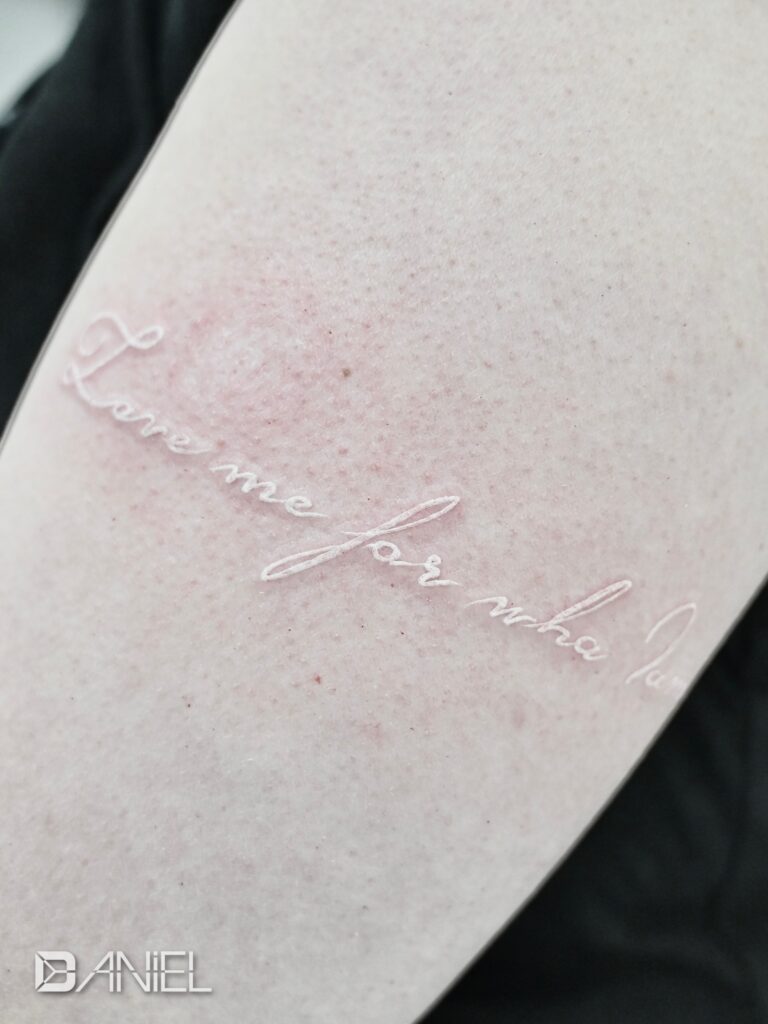 lettering white tattoo Daniel