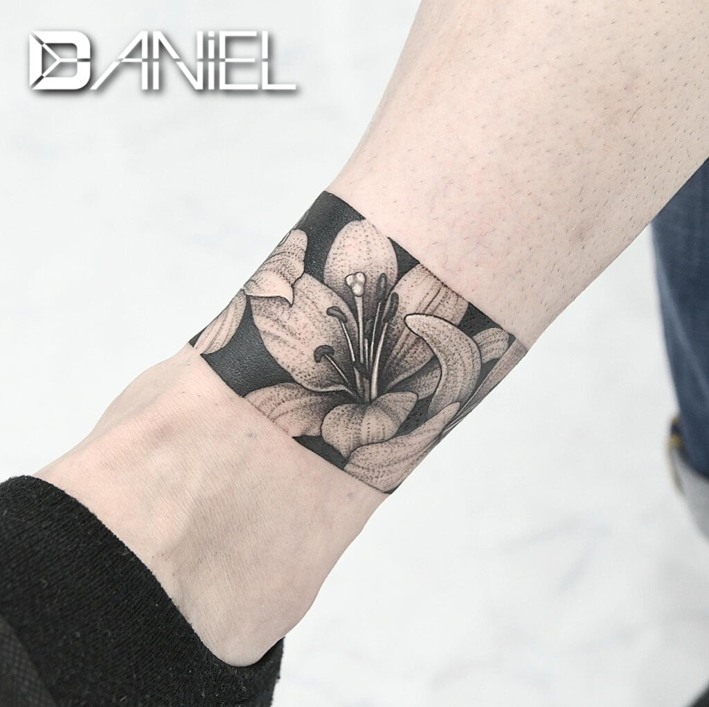 lily ring tattoo Daniel
