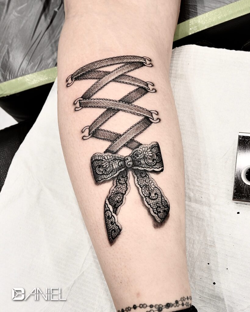 ribbon tattoo Daniel