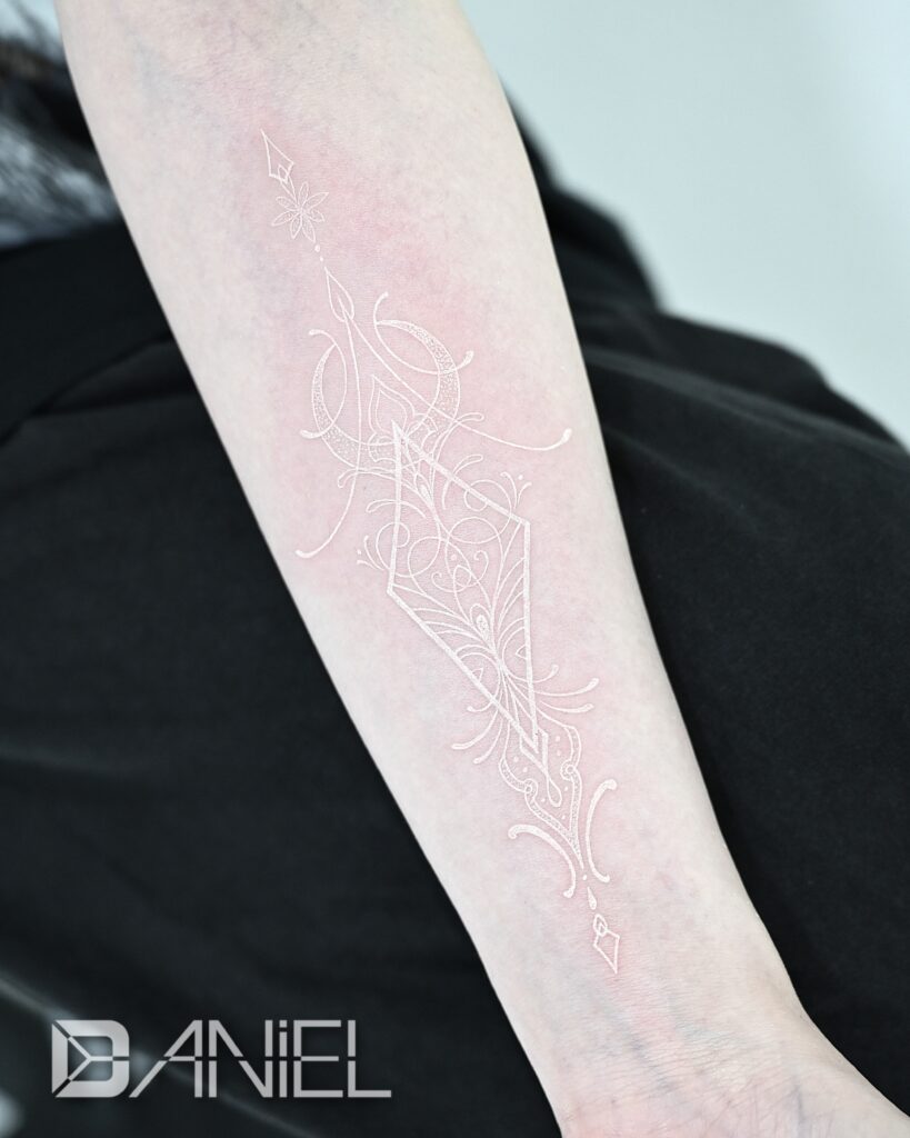 white geometric tattoo daniel