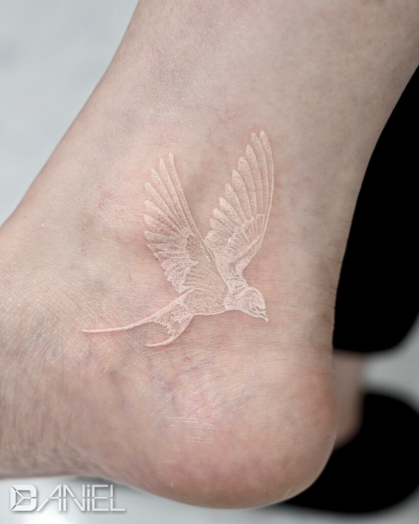 white swallow tattoo daniel 02